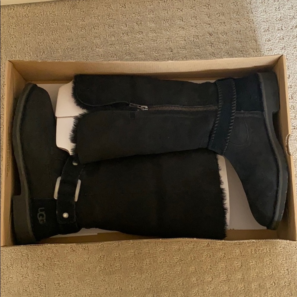 Water resistant UGG boots with buckle detail